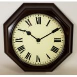 20th century GPO octagonal bakelite cased slave wall clock with circular Roman dial,