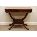 George III mahogany fold over swivel baize lined top card table, lyre shaped support,