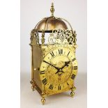 20th century brass lantern clock in 17th century style, scrolled dolphin crestings,