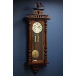 Large late 19th century walnut Vienna style wall clock, enamel dial with subsidiary seconds,