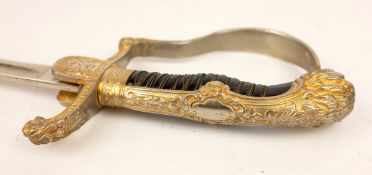 Colombian Policia Nacional sword, wire bound grip and curved gilt guard with lions head detail,