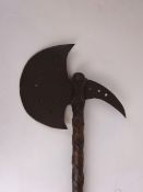 Viking type axe, metal blade with leather bound wooden handle,