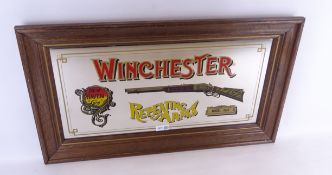 Winchester 'Repeating Arms' advertising mirror, in oak frame,
