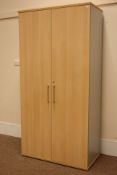 (STK10107) Large light oak finish lockable two door office storage cabinet fitted with adjustable