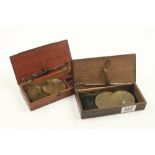 Two boxed sets of apothecaries scales with brass pans G+