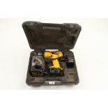 A DEWALT cordless drill with 3 batteries