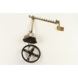 A brass roasting jack by HOLDEN & NICHOLAS c/w brackets and hanging ring clockwork mechanism