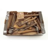 A box of hammers and mallets G