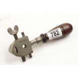 A MILLERS FALLS hand vice with rosewood handle G