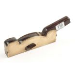 A 11/4" slightly skew mouthed shoulder plane with mahogany infill and screwed steel sole requires a