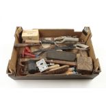 A box of builders tools hammers etc