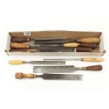 Ten paring gouges and a chisel one split handle G+