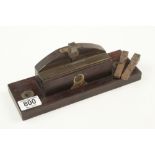 A pretty rosewood and brass punch type saw set with three irons G+