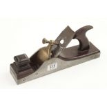 A 131/2" iron panel plane with overstuffed mahogany infill and open handle G