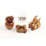 A set of three recent carved fruitwood or boxwood netsukies in form of mouse rabbit and otter N