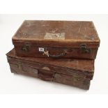 A leather suitcase with trade label VICTOR TRUNK Co and another