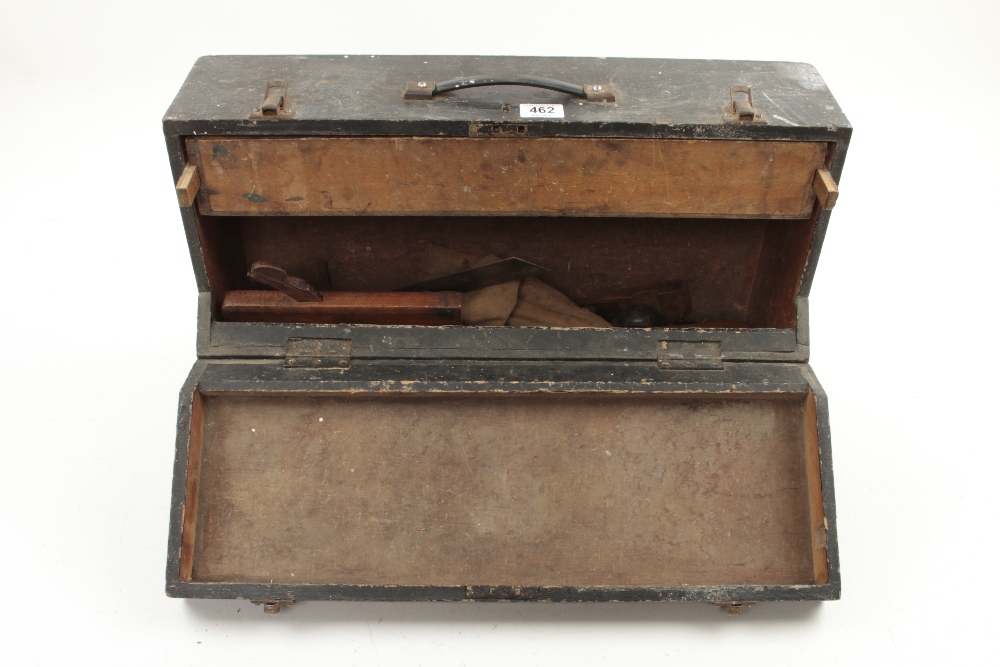 A small pine carrying case with some tools G