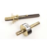 A brass stemmed ebony mortice gauge and another with brass head G+