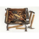 A kit of leather workers tools inc five hammers, two knives, numerous punches,