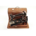 A hand operated sewing machine by WHEELER & WILSON Bridgeport USA No W9 in orig carrying case lacks
