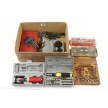 Seven small boxed tool sets