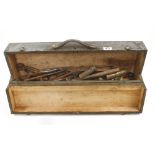 A small carrying case of tools some rusty