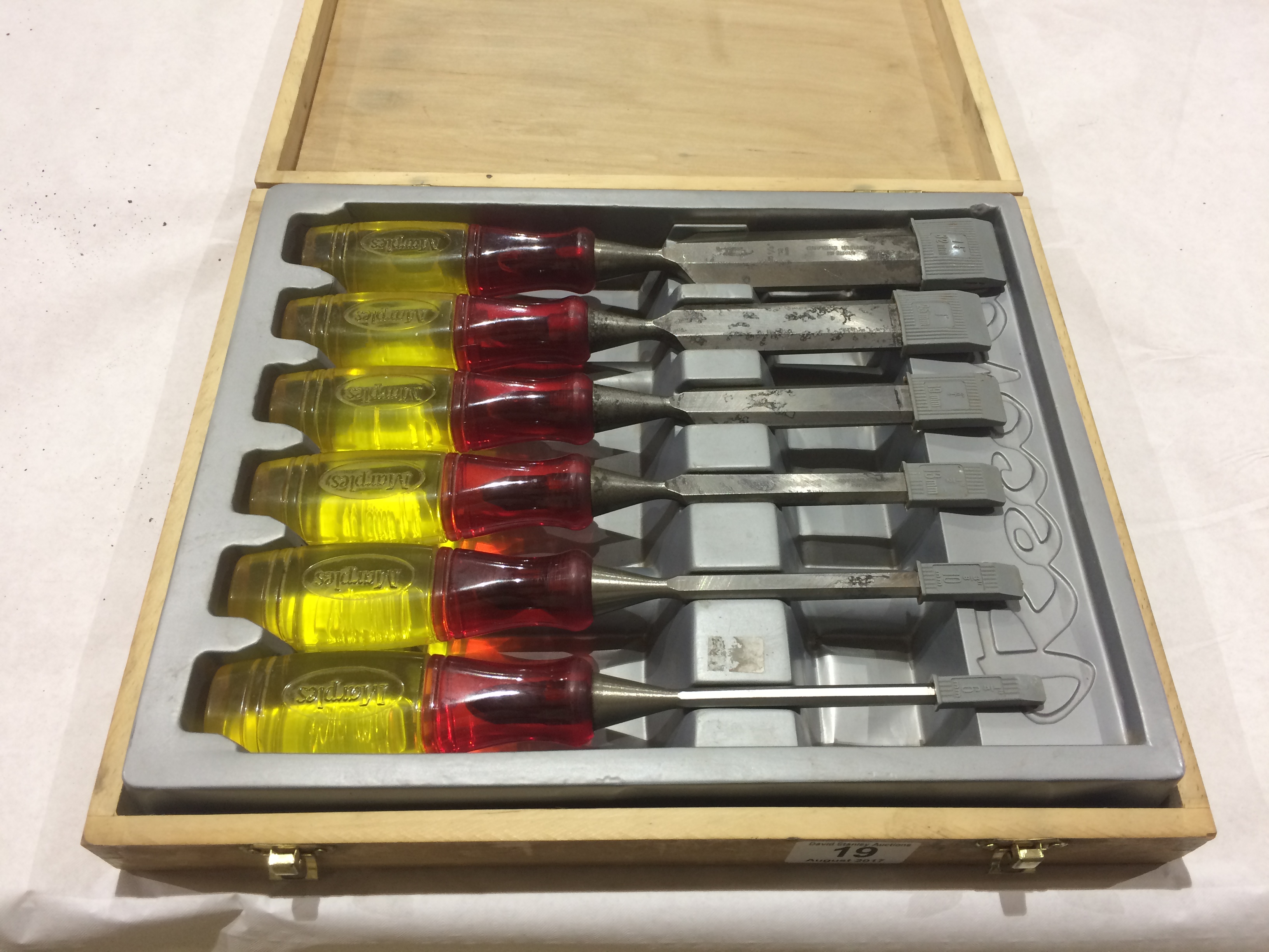 A set of 6 RECORD/MARPLES bevel edge chisels with plastic handles,