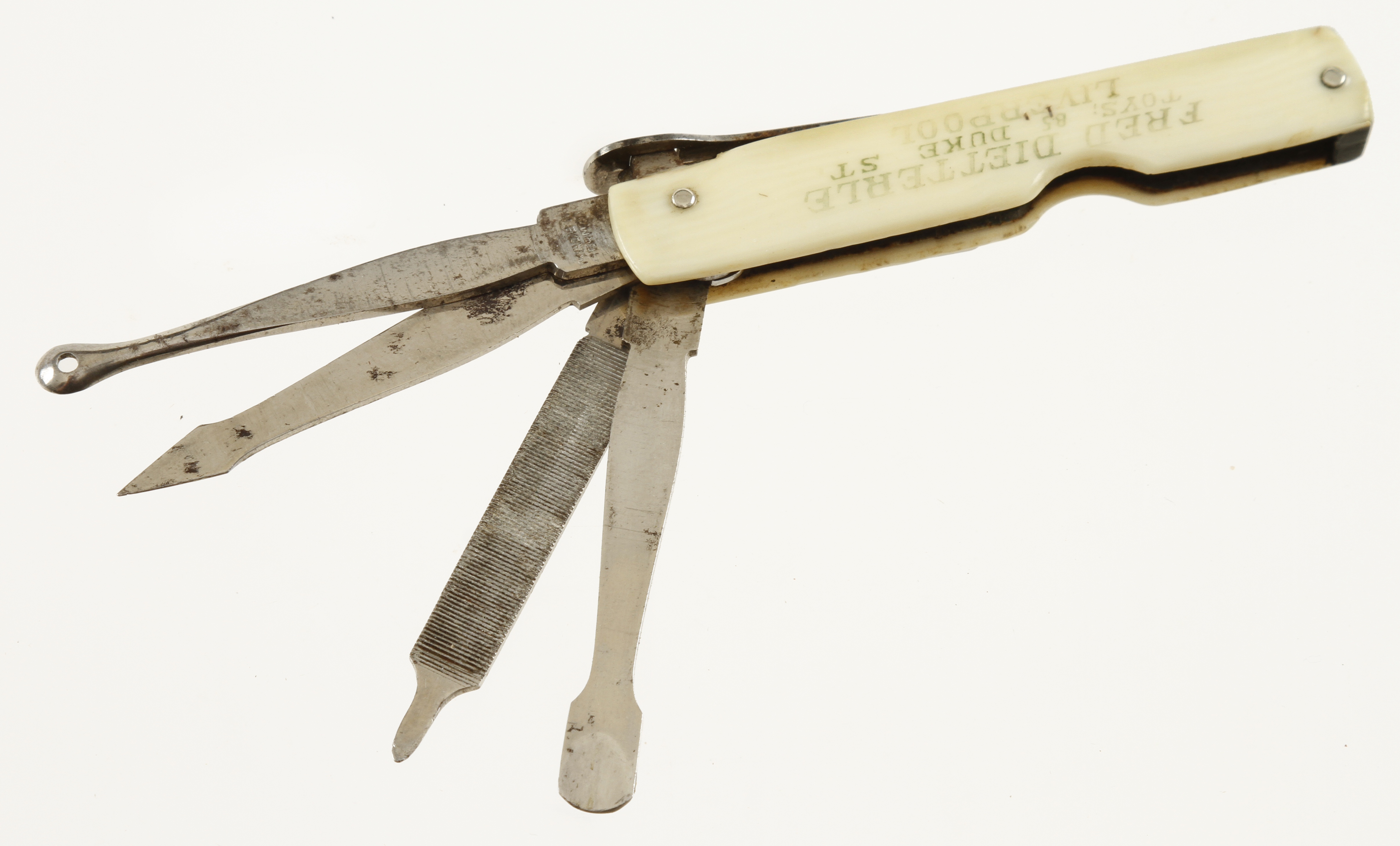 A unusual "personal hygiene" tool by Fred Dietterle Liverpool with 4 folding implements ie nail