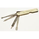 A unusual "personal hygiene" tool by Fred Dietterle Liverpool with 4 folding implements ie nail