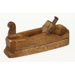 An 18c German scrub plane 8" x 2" dated I.H.M.