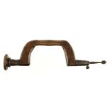 An 18c beech brace with turned iron pad and thumb screw G