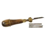 A small compendium tool with 4 tools in attractively figured horn handle with brass fittings G++