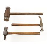 Three shipwright's hammers; a small caulking mallet,