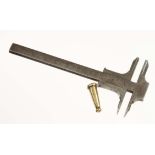 A 10cm/4" French inside and outside vernier gauge with unusual brass screw on cover G+