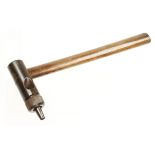 An unusual leatherworkers hammer/punch,