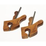 A pair of miniature boxwood tailed compassed flat and round planes the soles 2" x 5/8" G+