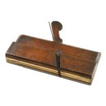 A 7 1/2" side bead moulding plane by MANNERS with bone sole G