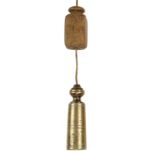 An 18c masons 4 1/2" bronze plum bob of early tapered form with knurled decoration and acorn finial