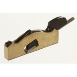 A small steel soled brass shoulder plane 6" x 3/4" with rhino horn ebony infill and wedge G+