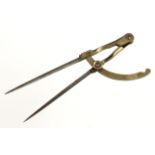 A fine 18c pair of French brass wing dividers with chamfered decoration and steel points 7" o/a G++