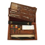 An early surveyors German silver drawing set with 6 ivory handled pens c/w set of paints beneath