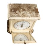 An early set of bathroom scales by BELMONT to weigh 50 stone (700 lbs) the dial viewed through a