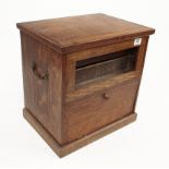 A small oak cabinet 17"x12"x17" with lift up lid and drop down front.