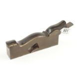 A little used 11/2" steel soled gunmetal shoulder plane by MILLER with ebony infill and wedge