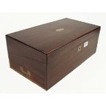 A quality mahogany veneered box with brass fittings,