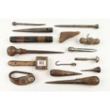 15 sailmakers tools: serving mallet, sail hook, sailors palm, marline spike,