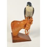BILL PRICKETT Peregrine Falcon on Glove In lime wood mounted on walnut Initialed and dated