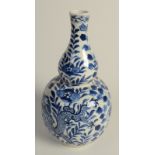 A late 19th century Chinese blue and white porcelain double gourd vase,