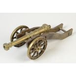 A brass model of a cannon, length 46cm.