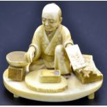 A Japanese ivory okimono,